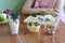 Girl sitting at the table. apples on a wooden Board in the kitchen. Food preparation