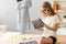 Girl sitting on table in studio