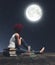 Girl sitting on wooden floors looking to the moon