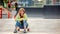 Girl with skateboard outdoors