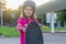 Girl skateboarding on natural background