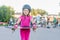 Girl skateboarding on natural background