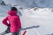 Girl skier watching empty slope in Solden ski resort, Solden, Austria, Europe