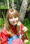 Girl Slavic with chamomile outdoor