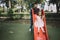 Girl sliding on slide with her father