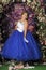 Girl in a smart blue and white ball gown