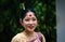 Girl smiling face isolated dressed in traditional wearing on festival with blurred background