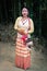 Girl smiling face isolated dressed in traditional wearing on festival with blurred background