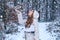 Girl in snow. Vintage winter person. Models having fun in winter park. Global cooling. Winter portrait of young woman in