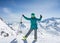 Girl snowboarder on the background of high snow-capped Alps, Austria