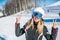 Girl snowboarder or skier macro face white healmet