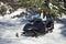 Girl on snowmobile