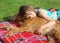 Girl snuggle a Dog