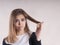 Girl with split hair problem perplexity