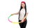 A girl in sport suit with hula hoop