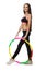 A girl in sport suit with hula hoop isolated on