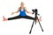 Girl in sportswear doing sports in front of the camera on a white studio background