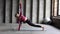 Girl with sportswear practices yoga. Pilates and stretching instructor