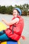Girl - sportswoman on a raft floats