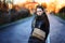 Girl standing in the alley in the park