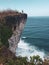 Girl standing on the cliff