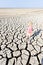 Girl standing on dry land