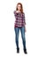 A girl standing in full length confident shows a finger at the c