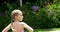 Girl standing next to swimming pool