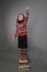 Girl standing on pile of books