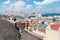 Girl standing on the roof and looking at city Istanbul