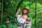 Girl standing on the rope bridge