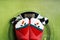 Girl standing on the scales in Christmas fun red green socks with snowman