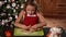 Girl stretching the christmas cookie dough