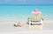 Girl in a striped hat on the beach