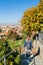 Girl strolling through the rose garden in autumn Florence, Tuscany, Italy.