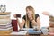 Girl student doing night yawns, holding another cup of coffee hands