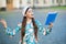 Girl student reading book outdoors, recite poetry concept