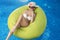 Girl sunbathing in the pool. luxurious resort concept