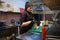 Girl sushi chef prepares food in the kitchen at restaurant