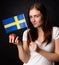 Girl with Swedish flag holding an apple (ingrid marie)