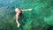 Girl swimming in sea