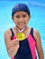 Girl in swimsuit with medals