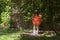 Girl swinging at the playground. Garden. Nature.