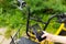 Girl takes a photo of the details of a bicycle. ecological transport