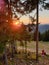 Girl taking photo at sunset in the mountains