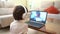 Girl talking by videoconference to her mother, who is isolated by Covid-19