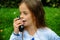 Girl talks on  walkie talkie
