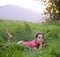 Girl in tall grass