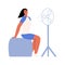 A girl tanned in summer cools down sitting next to a fan. Vector illustration in a flat style