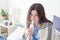 Girl teenager makes inhalation using  compressor